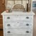 antique wood dresser that has been repainted with white chalk paint
