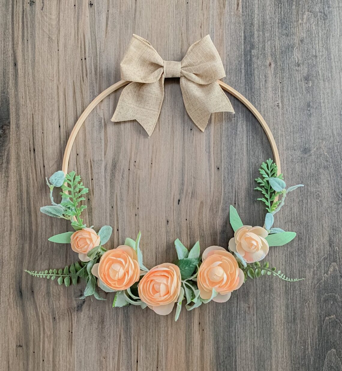 floral embroidery hoop wreath with greenery and peach flowers for spring to summer decor